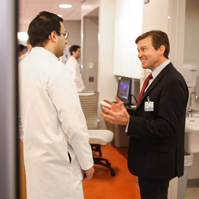 Peter Pronovost talking to person