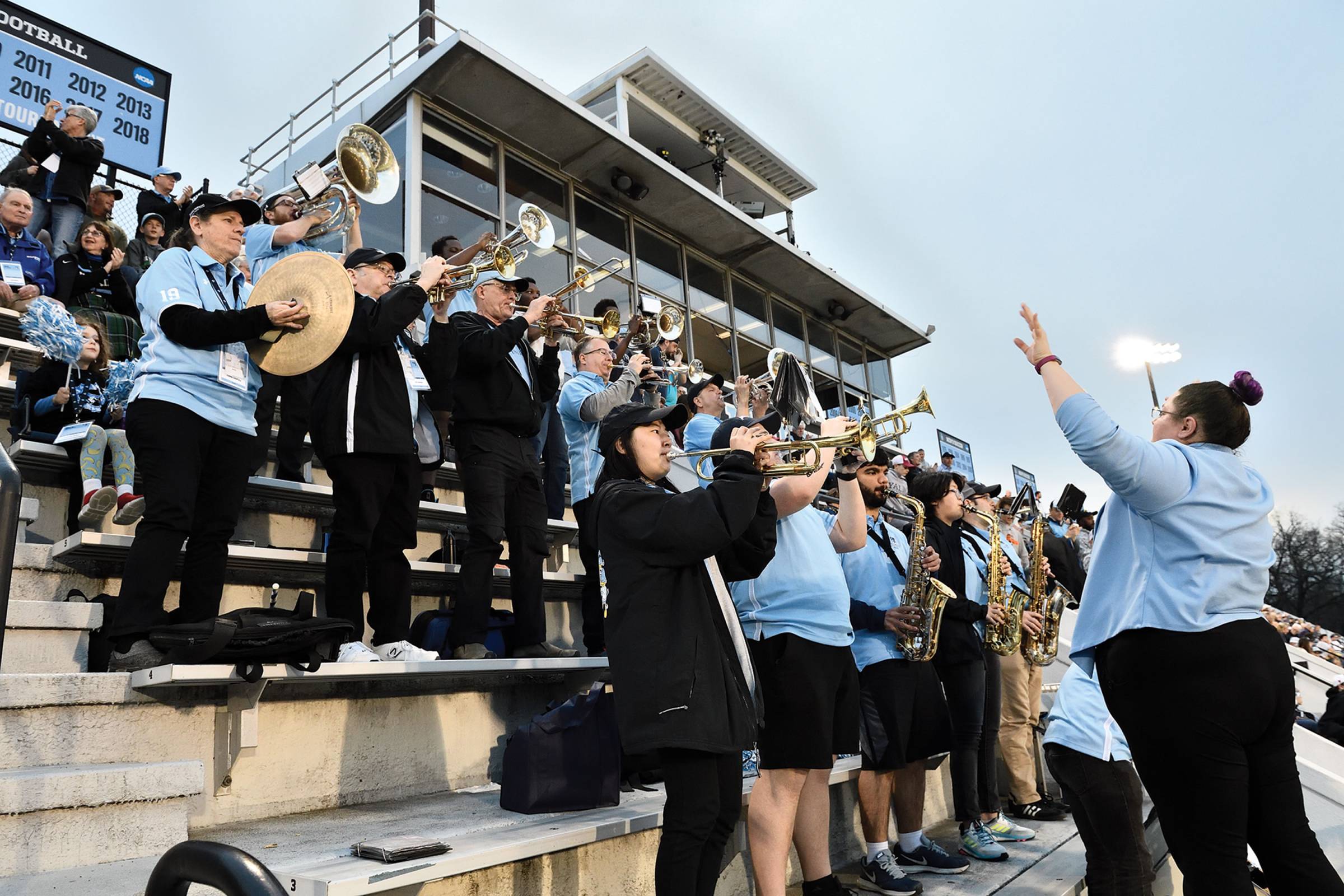 A small pep band plays in the stands